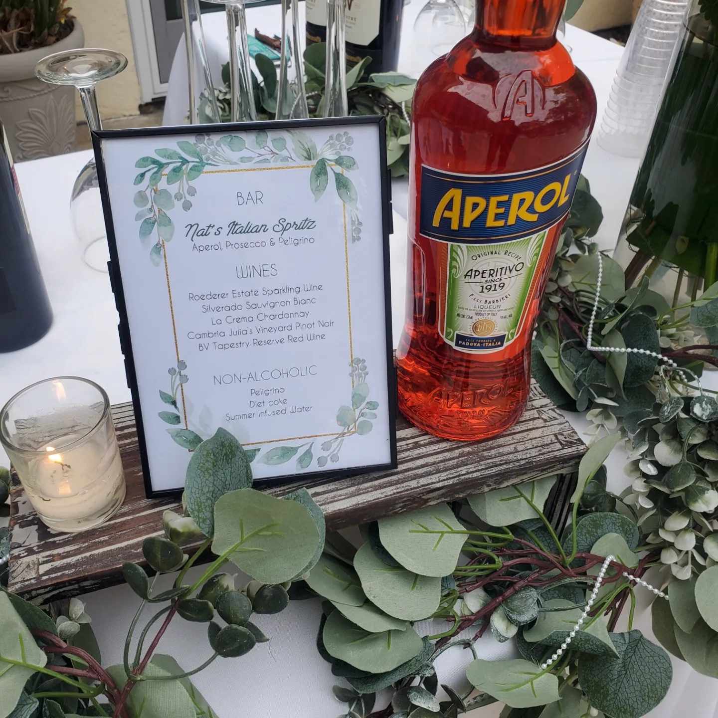 bar sign and bottle of alcohol